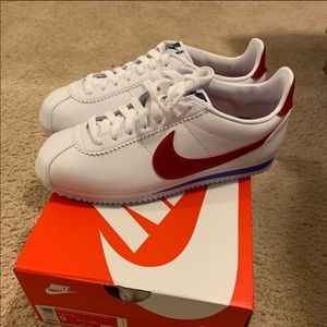 White red and blue Nike Cortez